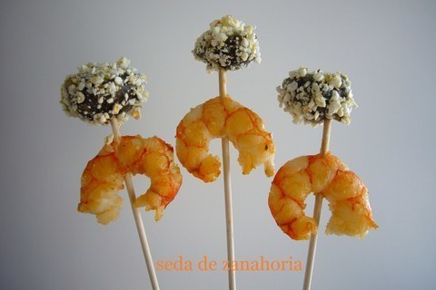 Receta de mollejas de pato confitadas con maíz asustado y un gambón